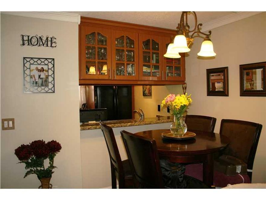 BEAUTIFULLY UPDATED 2BED/2BA 1ST FLOOR LAKEFRONT CONDO IN THE HEART OF CORAL SPRINGS! COMPLEX IS LOCATED IN A GREAT FAMILY AREA CENTRALLY LOCATED NEAR EXCELLENT SCHOOLS, CORAL SQUARE MALL, RESTAURANTS & MAJOR HIGHWAYS. UNIT HAS A GREAT VIEW OF LAKE & POOL  AREA, UPDATED KITCHEN WITH FLOOR TO CEILING CABINETS & GRANITE COUNTERS, LAMINATE FLOORS, SPACIOUS LIVING/DINING AREA, WASHER AND DRYER IN UNIT, CROWN MOLDING, UPDATED MASTER VANITY, READY FOR YOU TO MOVE RIGHT IN!  SMALL PETS ALLOWED & LEASE RIGHT AWAY!