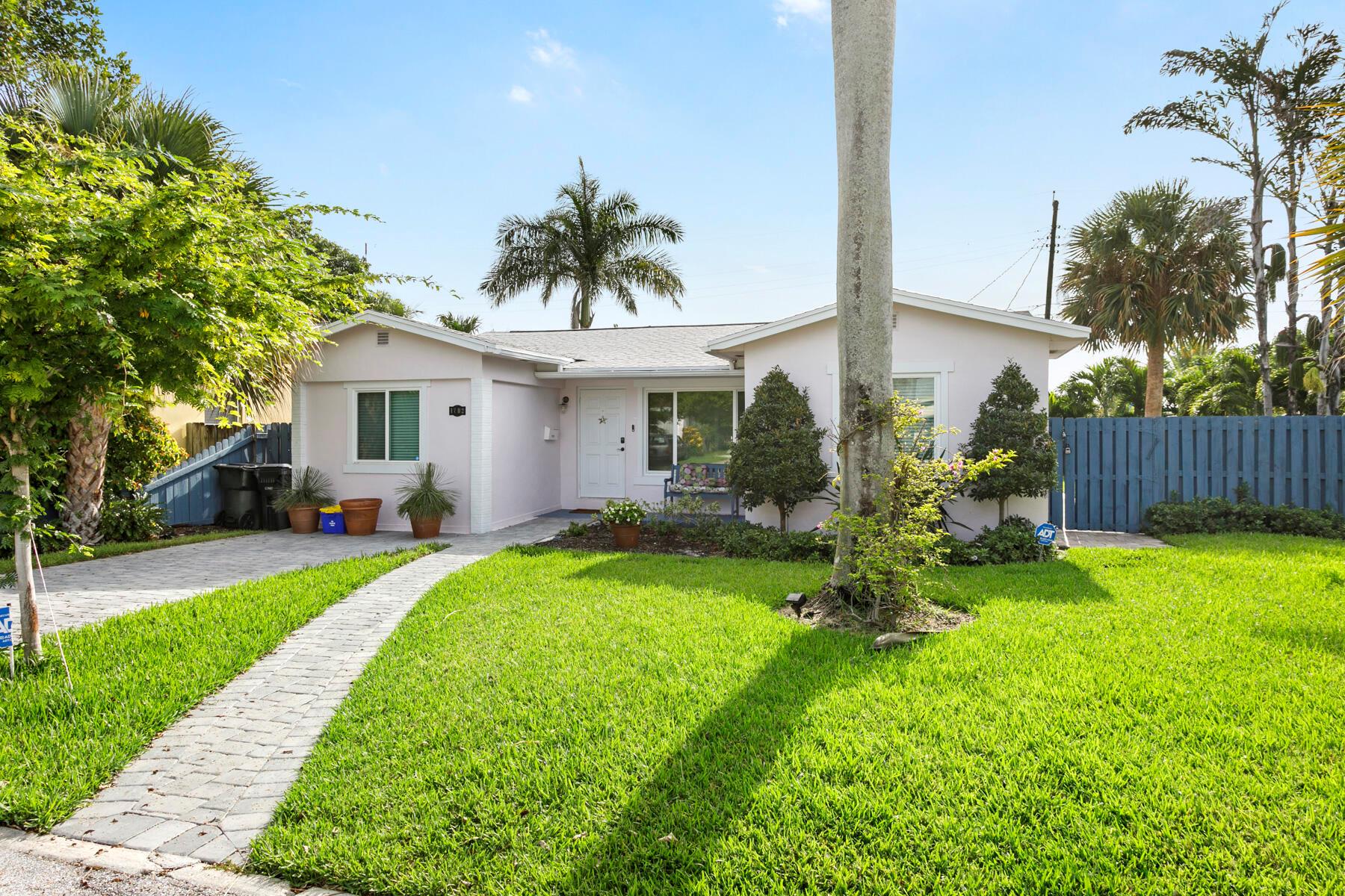 Wonderful renovated 3 bedroom, 2 bath home with lush landscaping, salt water pool , and large patio all on a quiet Lake Worth Beach street.