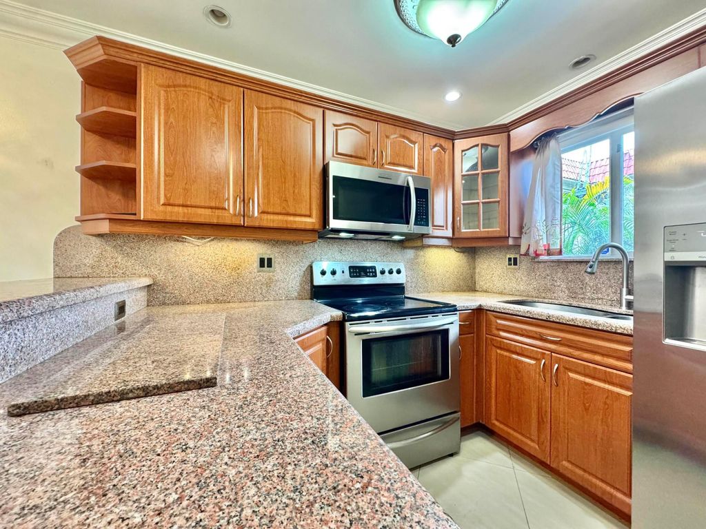 Photo of 6074 Forest Hill Boulevard #107, West Palm Beach, FL 33415 (MLS # B26038313)