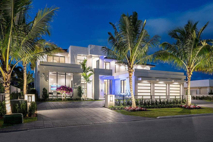 329 Royal Palm Way is a Brand New Golf Course SRD Building Corp. Signature Estate. With 104′ overlooking the Jack Nicklaus Signature Golf Course in Royal Palm Yacht & Country Club, this home has 5 bedrooms, +8,300 sf living space with an open floor plan, towering windows, and trendy interiors. The home includes a formal dining area, club room with stunning bar, dedicated study, multiple living rooms, and a sprawling 1st-floor main suite complete with morning bar, glass shower room, and His & Her boutique closets overlooking the golf course. The dazzling pool is the perfect centerpiece, wrapped by a large patio, covered loggia, summer kitchen, and infinite golf views. Buyer to pay documentary stamp taxes on the deed and title insurance.