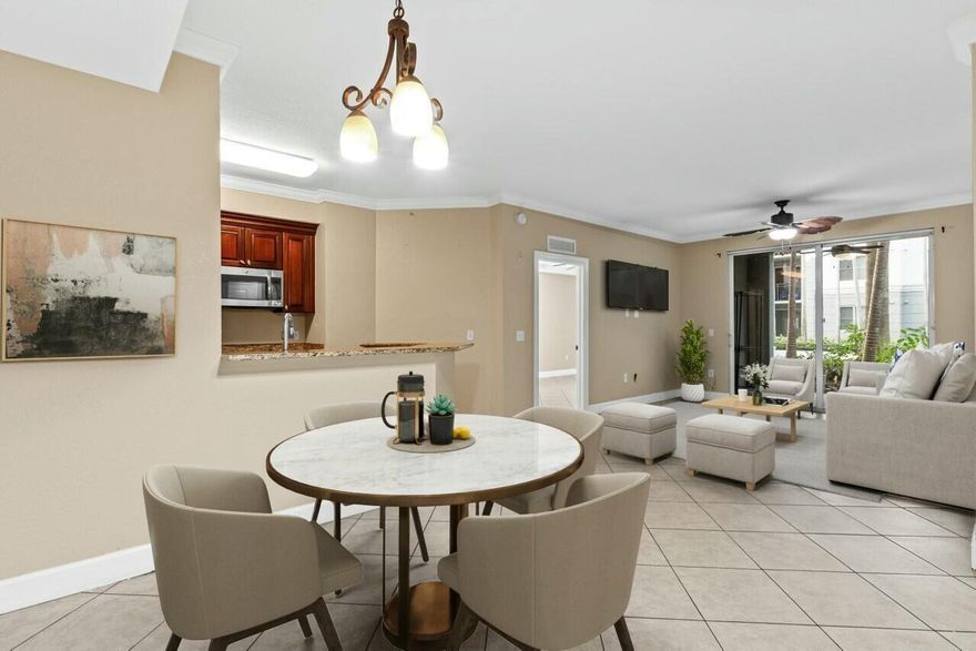 Prime Location 2-bed, 2-bath condo in Renaissance Commons. This first-floor is the largest two-bedroom floor plan, complete with cherry wood cabinets, granite countertops, and stainless steel appliances, impact glass, in condo laundry room and a covered patio overlooking the courtyard. The split floor plan, featuring a large master suite and guest bedroom. The gated community offers two assigned parking spaces in a secured garage and an array of amenities, including three pools with spas, fitness center, indoor basketball court, billiards and an event room. Located just minutes from I-95, Delray Beach, and pristine beaches, this pet-friendly community is within walking distance to popular restaurants and shopping.