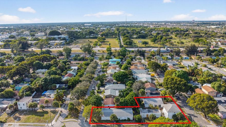 One of a kind INVESTMENT OPPORTUNITY! This rare offering features 3 lots with 4 buildings. 1 Duplex, 4 plex and a single family home and a garage building. Seven rentable units once renovated. The four plex requires a full renovation, making this the perfect value for investors or developers or those looking to build a long term portfolio wealth. Property is sold as is. Buyers must independently verify all information.