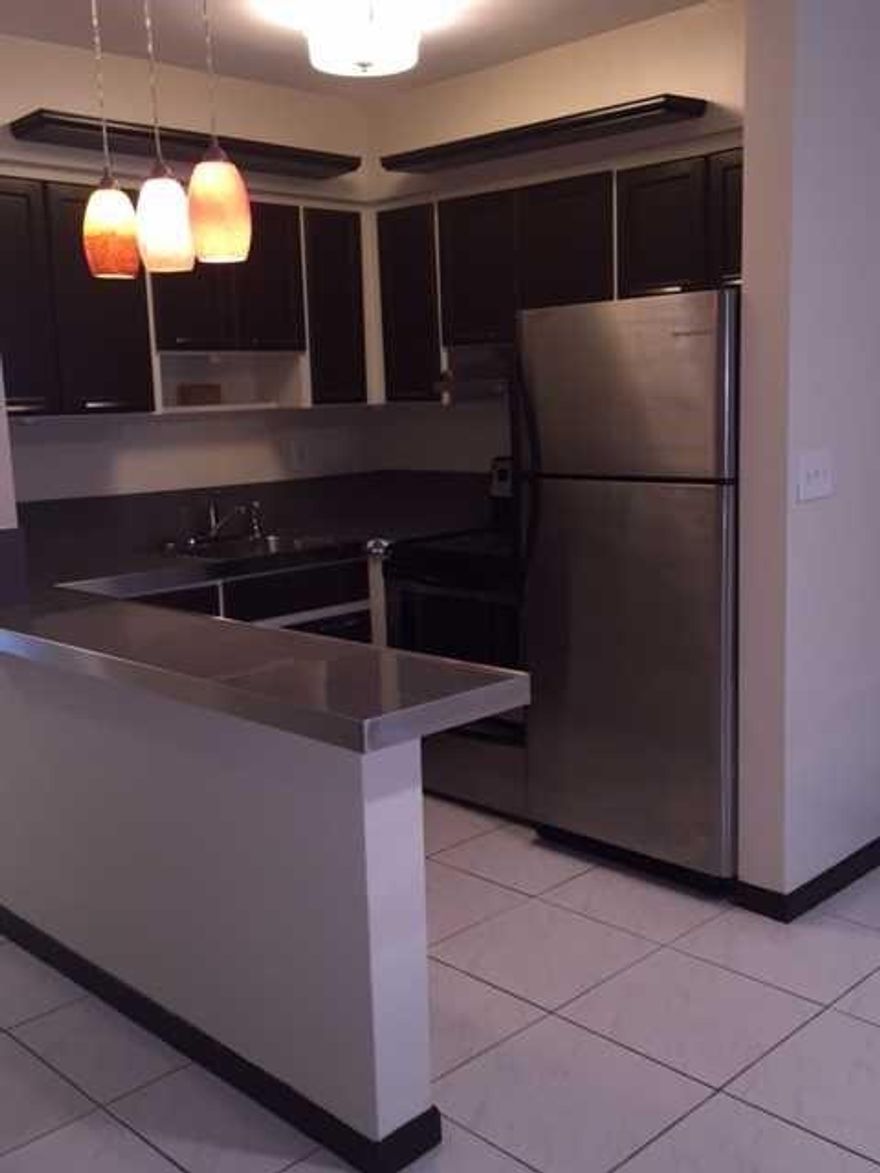 OUTSTANDING 2 BEDROOM CONDO WITH A VIEW OF THE LAKE* UPDATED KITCHEN WITH STAINLESS STEEL APPLIANCES AND UPDATED BATHROOM* TILE THROUGH OUT* 2 WALK IN CLOSTETS* COMMUNITY POOL, CLUBHOUSE, LAUNDRY ROOM AND ASSIGNED PARKING SPACE* PETS WELCOMED UP TO 20 LBS. * READY FOR IMMEDIATE OCCUPANCY!!