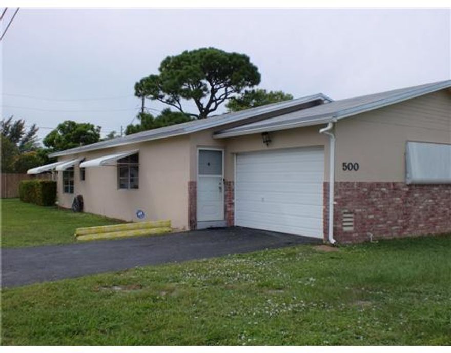 Adorable, renovated 2/2 PLUS family room (can be used as an office or 3rd bedroom) single family home with 1 car garage in desirable East Boca community. New stainless steel appliances, new kitchen cabinets, granite counter top. New vanities in bathrooms, new ceramic tiles in living areas. AC 1 yr old. Full size washer dryer in the garage, nice size back yard. Covered patio in a quiet East Boca neighborhood. Close to I-95, beaches, schools, shipping and houses of worship.