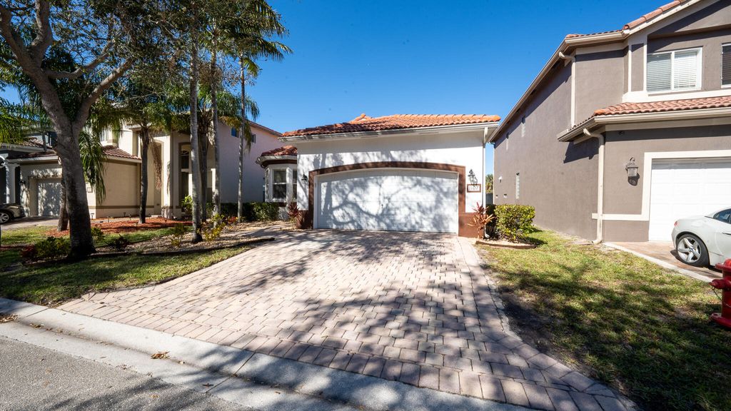 Photo of 1107 Center Stone Lane, Riviera Beach, FL 33404 (MLS # R11161827)