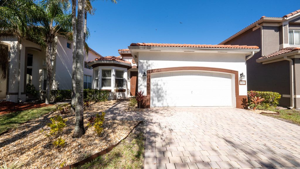 Photo of 1107 Center Stone Lane, Riviera Beach, FL 33404 (MLS # R11161827)