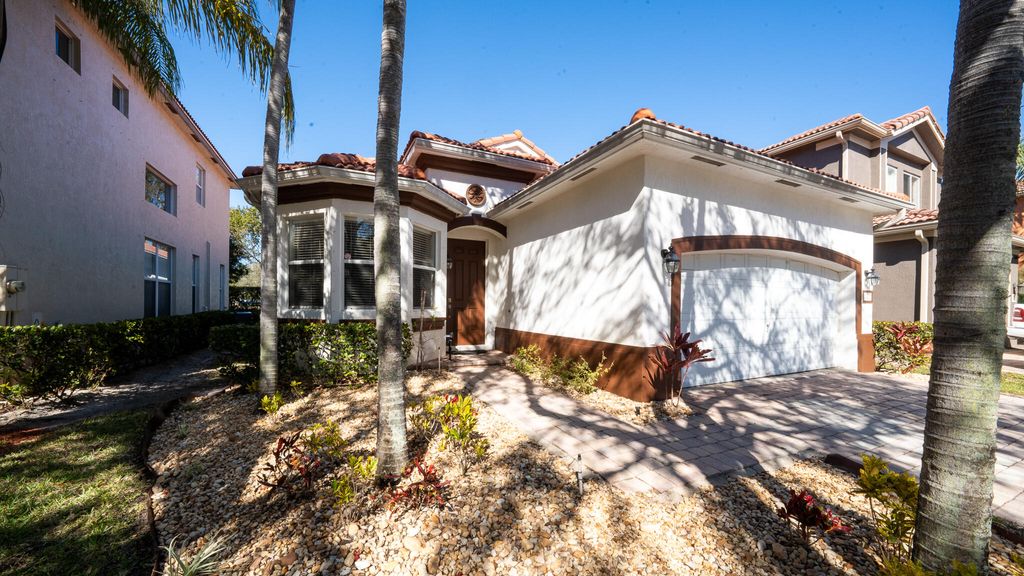 Photo of 1107 Center Stone Lane, Riviera Beach, FL 33404 (MLS # R11161827)