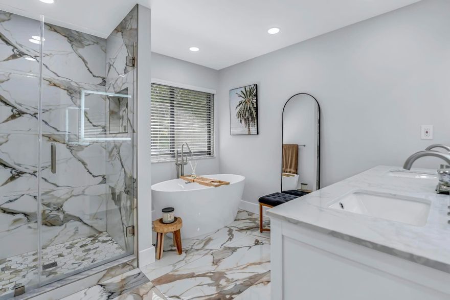 Stunning Home in Highly Desirable Southwest Ranches.  This beautifully maintained 4-bedroom, 2.5-bathroom pool home offers 3,798 sq. ft. of living space on a 1.12-acre lot. This  gated home features circular driveway, canopy, and 2 car garage. High ceilings, natural light, and large windows with double sliding glass doors.  Modern kitchen boasts stainless steel appliances, generous cabinet space, and  eat-in area. Primary suite features a sitting area, his/hers walk-in closets, and newly renovated  bathroom. The home offers two-bedroom west wing, and fourth bedroom is ideal as a guest room, playroom, or office. Enjoy outdoor living in your private pool area, with plenty of space to entertain. Home is conveniently located near supermarkets, restaurants and major Highway.