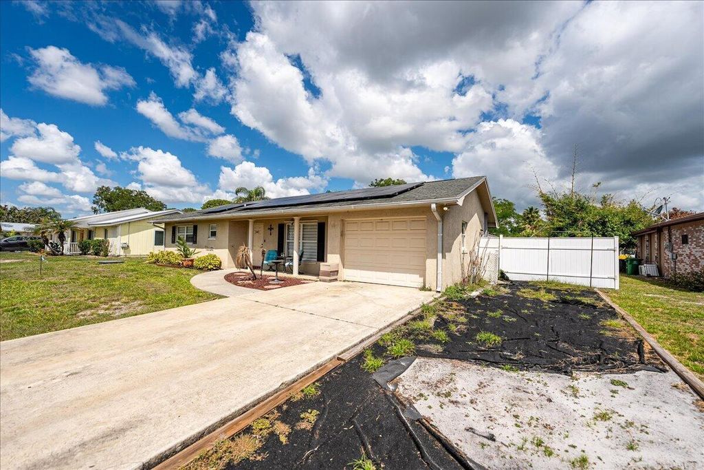 Photo of 583 SE Greenway Terrace, Port Saint Lucie, FL 34983 (MLS # B26020219)