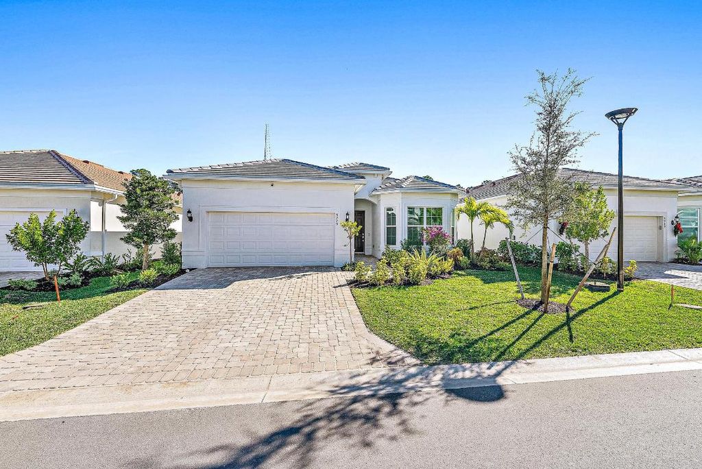 Photo of 9775 SW Meridian Way, Stuart, FL 34997 (MLS # R10976403)