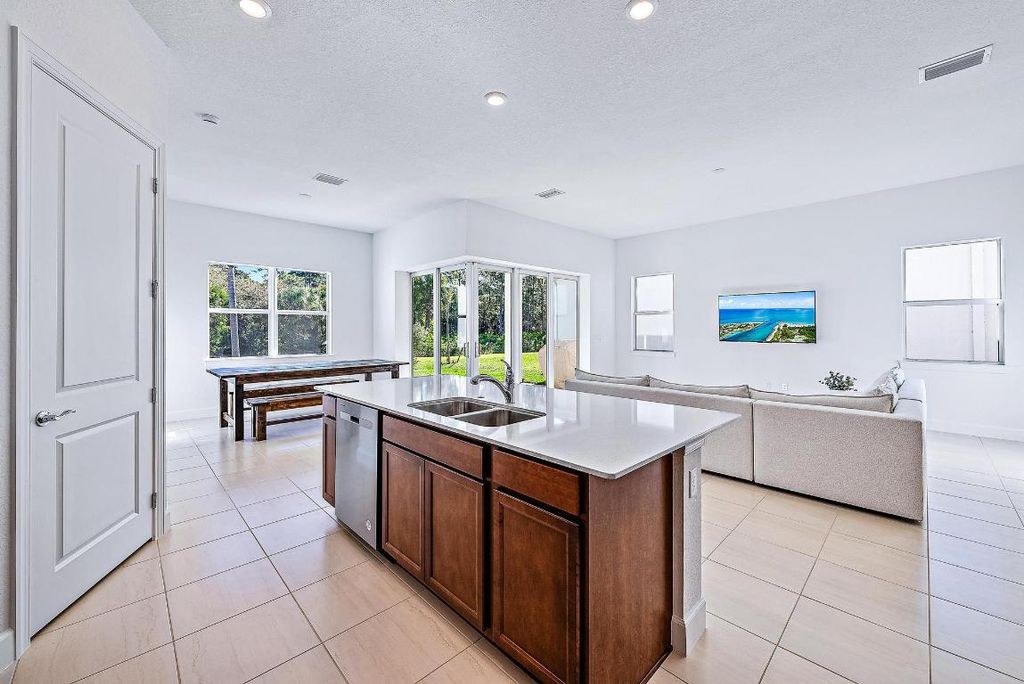 Photo of 9775 SW Meridian Way, Stuart, FL 34997 (MLS # R10976403)