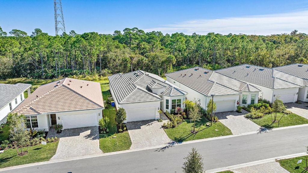 Photo of 9775 SW Meridian Way, Stuart, FL 34997 (MLS # R10976403)