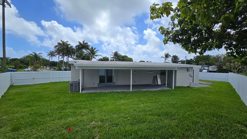 Photo of 591 Seagrape Road, Lantana, FL 33462 (MLS # B26010987)