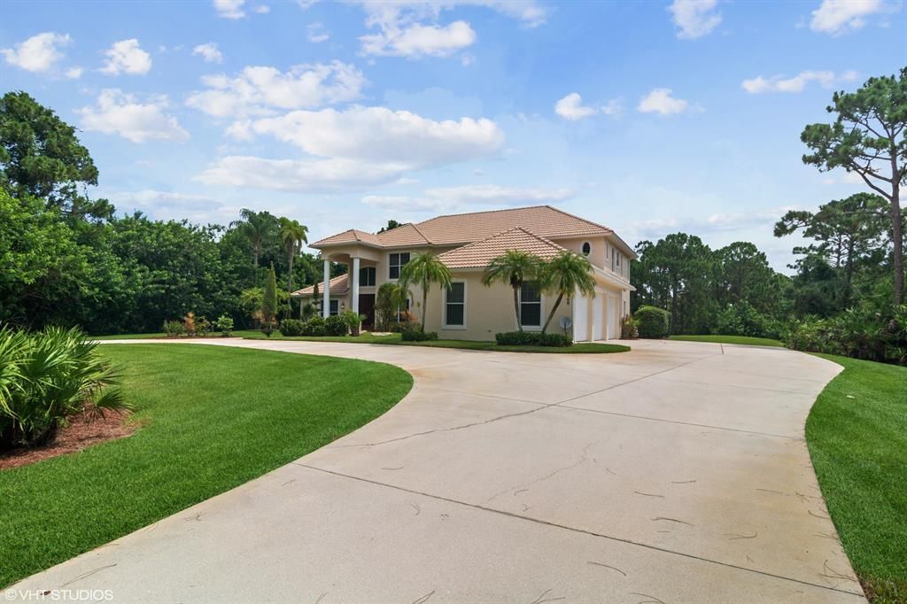 Photo of 10960 Myrtlewood Lane, Port Saint Lucie, FL 34986 (MLS # R10730466)