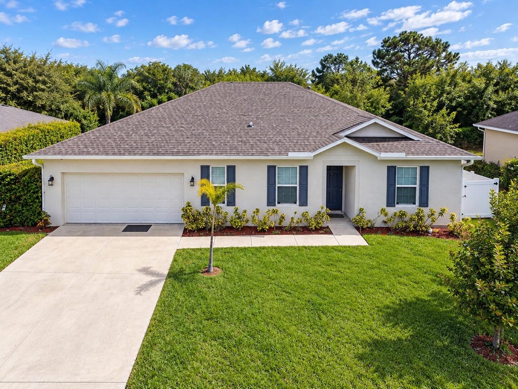 Photo of 1025 SW SARTO Lane, Port Saint Lucie, FL 34953 (MLS # B26076406)