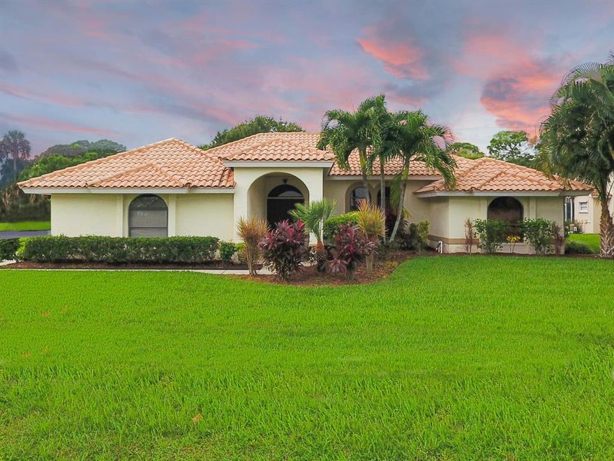 Buyers changed their mind so now is your chance to grab this great home. .Includes 1 year home maintenance Warranty..Desirable Community of Heatherwood in''St Lucie West''.This 3 Bedroom 2 bath Mediterranean Style Home sits on a beautiful large corner lot. Upgraded kitchen and bathrooms are just a few of the benefits you will enjoy while owning this home. Kitchen includes stainless appliances, updated cabinets and granite counter-tops. Master bedroom includes attached bathroom with separate walk-in shower,dual sinks, walk in master closet with built-ins. and access to large covered tiled lanai. Backyard can easily accommodate large pool with views of expansive yard ,native trees and community picnic area and lake. 2/3 of One Quarter Cap Contribution due at closing from buyer. Fast Closing