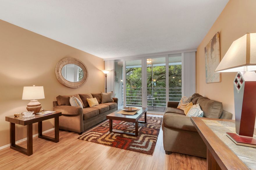 * Investor and Pet Friendly top-floor condo with tranquil views of beautiful live oak tree views in desirable Pine Island Ridge * Feels like being in your own personal "tree house" * This move-in ready unit features a recently remodeled kitchen and bathrooms w/durable high-grade Formica countertops, newer appliances, AC and impact windows/doors. Located in a resort-style country club community with golf, clubhouse, pools, fine dining and fitness amenities. Excellent opportunity for both end users and investors with strong rental demand due to proximity to Nova Southeastern University, Broward College, major highways, shopping and airports * Can be rented 1st year * Two pets up to 25 lbs/each allowed * Can be sold furnished * Club membership included in monthly fee * Pride Home Warranty *