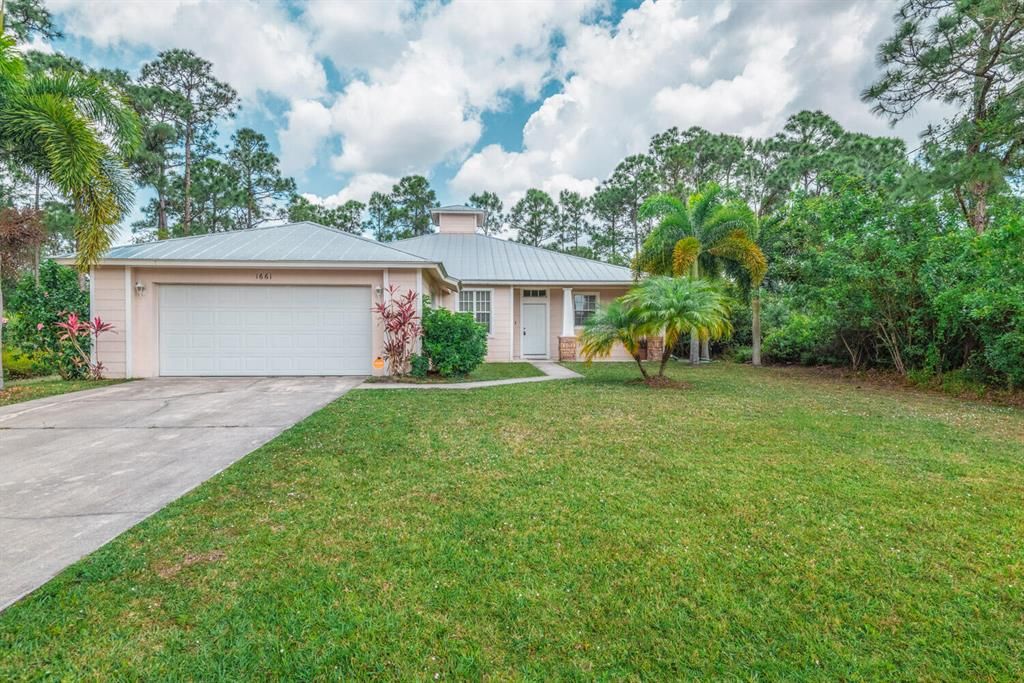 Photo of 1661 SW Levato Avenue, Port Saint Lucie, FL 34953 (MLS # R10807668)
