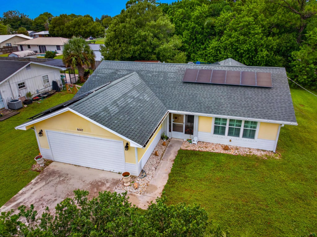 Photo of 6007 Raintree Trail, Fort Pierce, FL 34982 (MLS # B26075001)