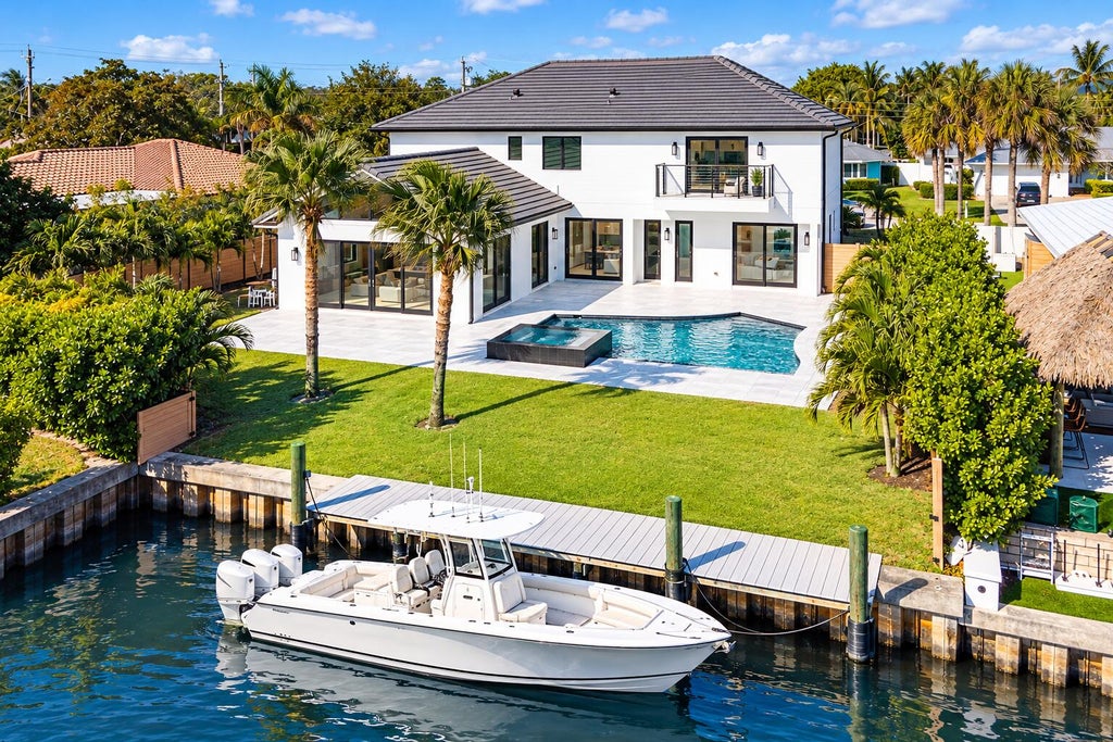 Photo of 8 LEEWARD Circle, Tequesta, FL 33469 (MLS # B26089015)