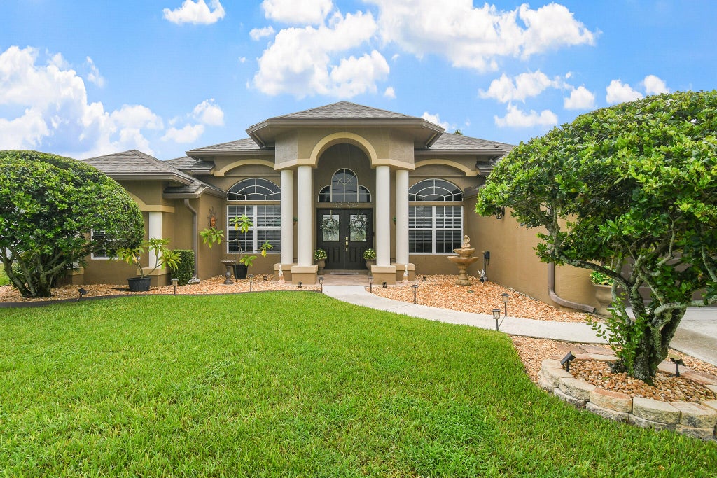 Photo of 390 SW Jeanne Avenue, Port Saint Lucie, FL 34953 (MLS # B26069767)