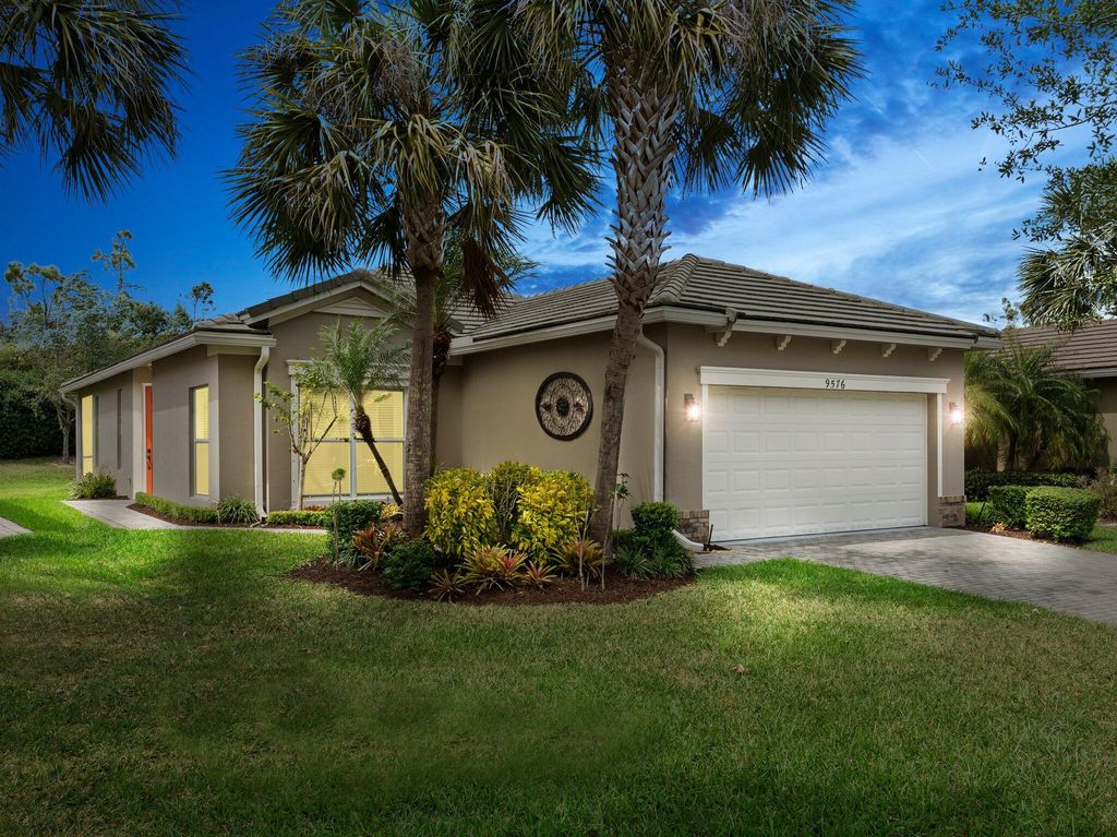 Photo of 9576 SW Flowermound Circle, Port Saint Lucie, FL 34987 (MLS # R10976118)