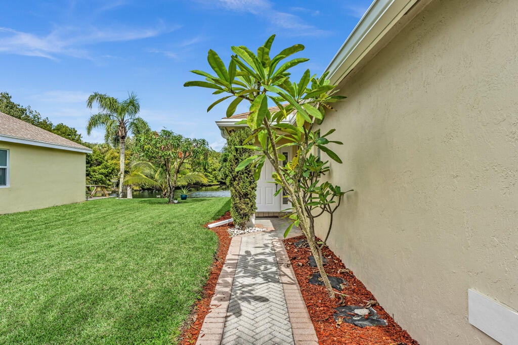 Photo of 1788 SAWGRASS Circle, Greenacres, FL 33413 (MLS # B26089997)