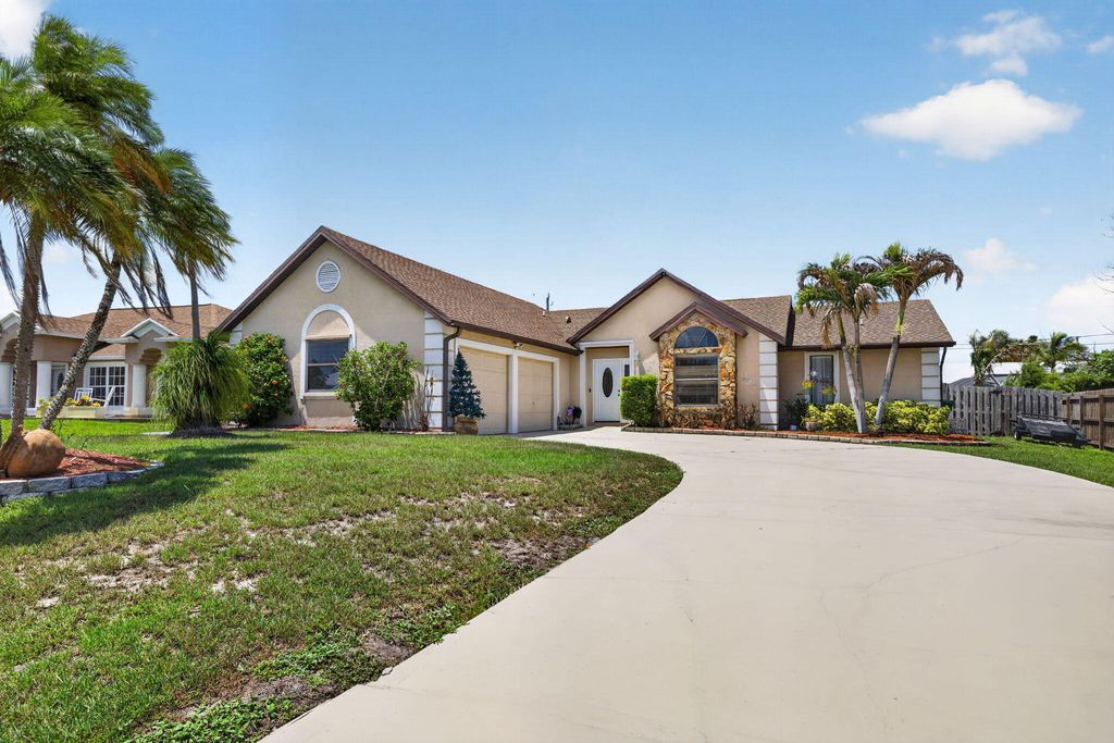 Photo of 437 SE Nome Drive, Port Saint Lucie, FL 34984 (MLS # B26041607)