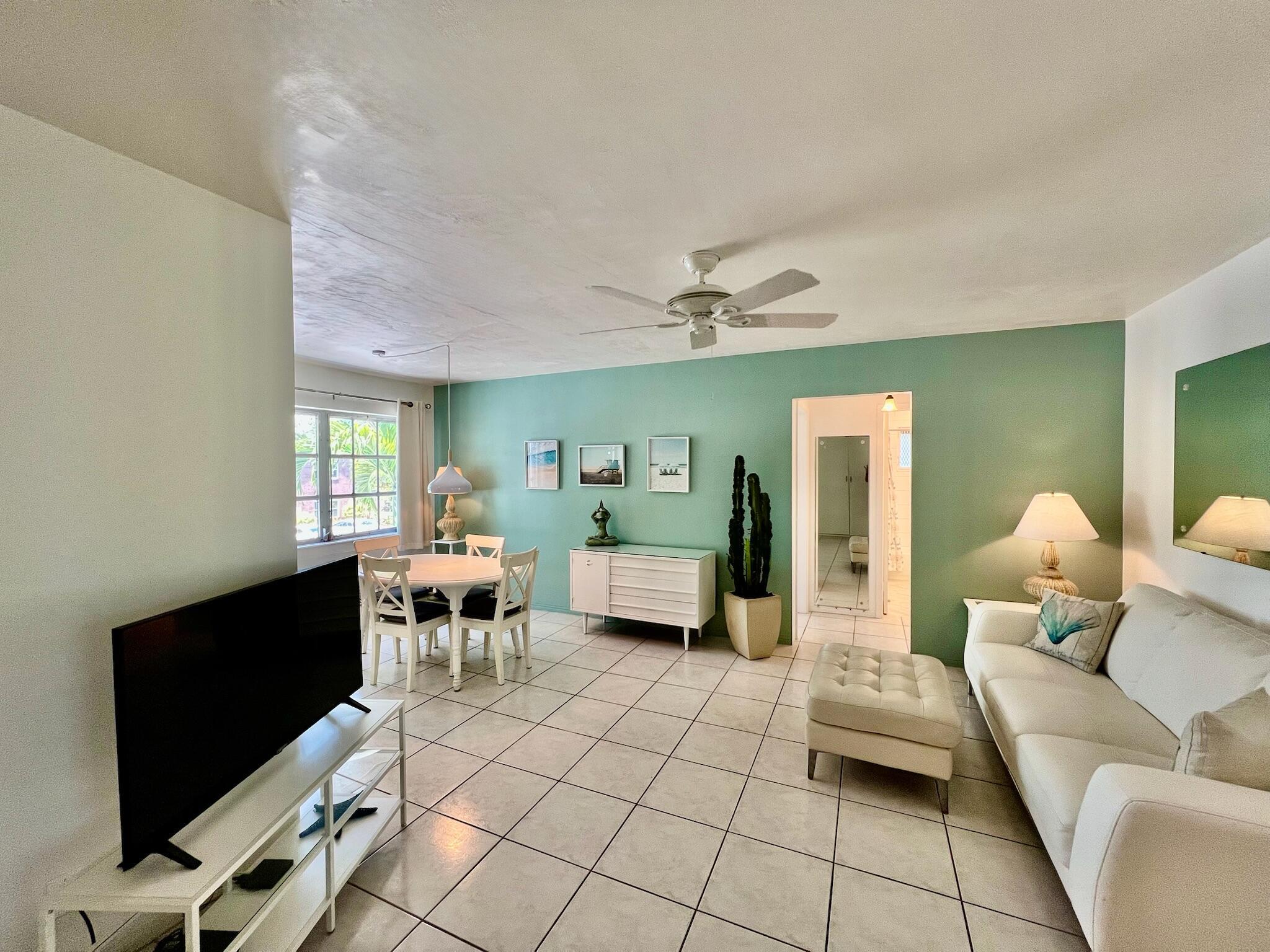 Investor Alert! Beautifully furnished and turnkey corner unit in a quiet 11-unit community. Impeccably maintained and tastefully decorated with a remodeled bathroom and a Murphy bed in the living room. Rent immediately--no waiting period! No age restrictions ! Very low HOA at just $350/month. Option to purchase adjacent 450 sq ft studio (unit #11) at only $ 94,000 --perfect for guests, family, or extra income. Prime location near US-1 and minutes from the beach. Don't miss this rare opportunity!