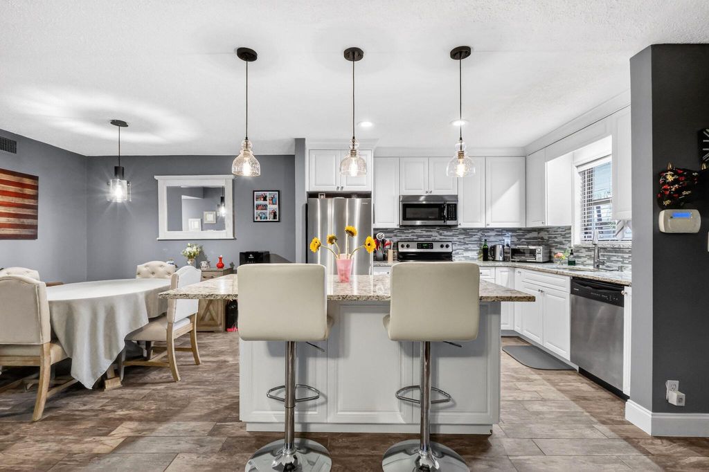 Photo of 501 Dotterel Road #27c, Delray Beach, FL 33444 (MLS # R11144620)