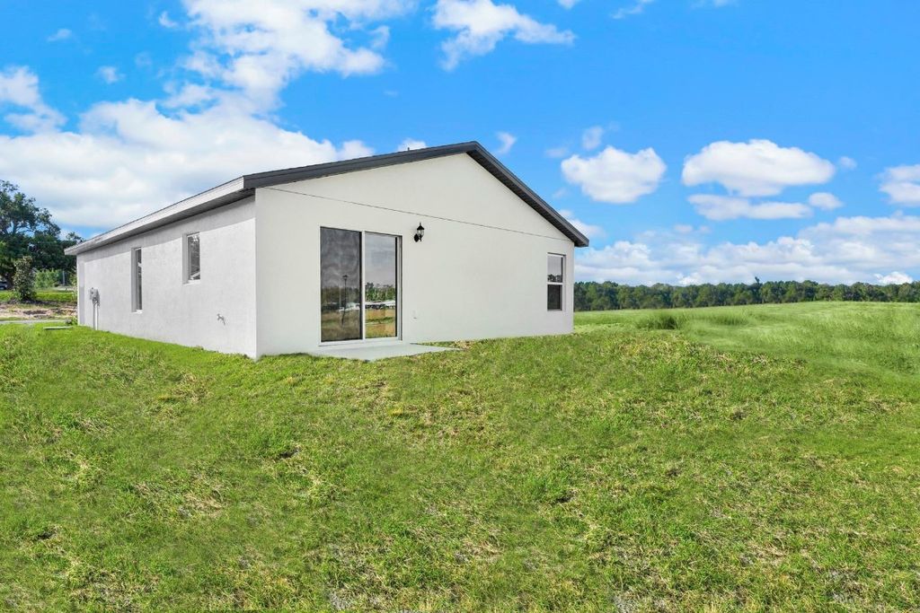 Photo of 8556 105th Avenue, Vero Beach, FL 32967 (MLS # F10545906)