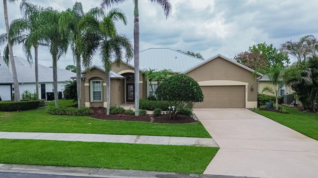 Photo of 208 SW Whitewood Drive, Port Saint Lucie, FL 34953 (MLS # B26028038)