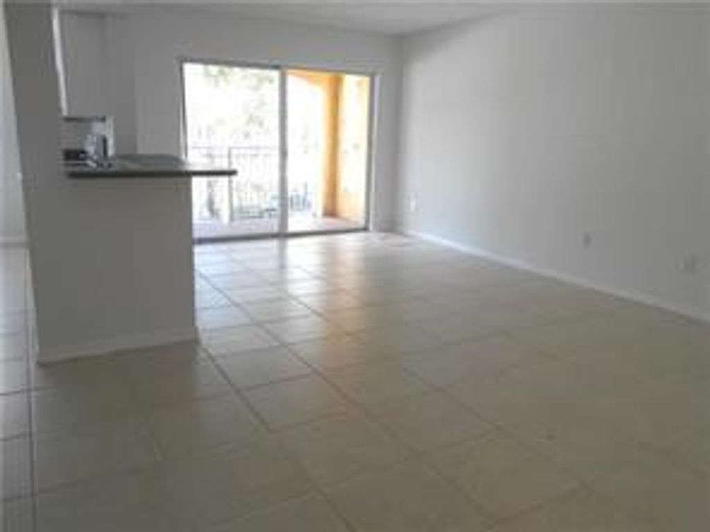 Photo of 9620 NW 2nd Street #7-201, Pembroke Pines, FL 33024 (MLS # B26048754)