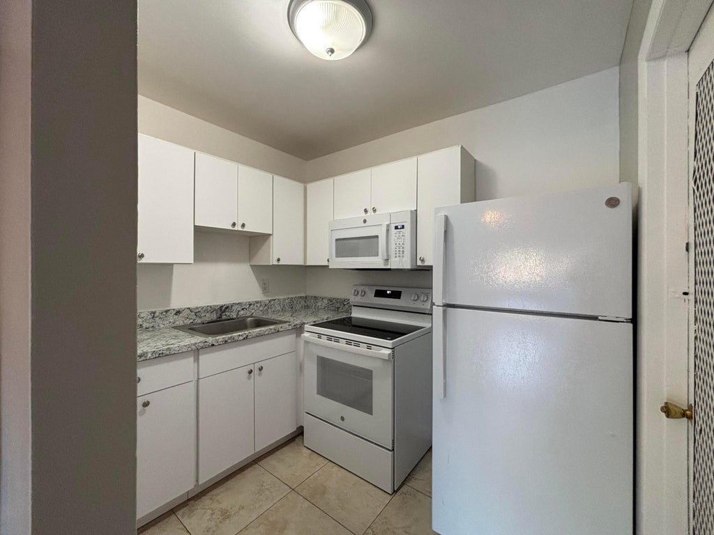 Photo of 491 NW 42nd Avenue #4, Plantation, FL 33317 (MLS # B26025055)