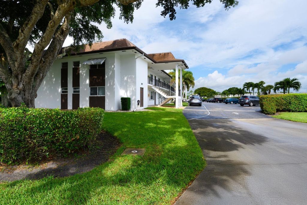 Photo of 3075 Gardens East Drive #14, Palm Beach Gardens, FL 33410 (MLS # R11131085)