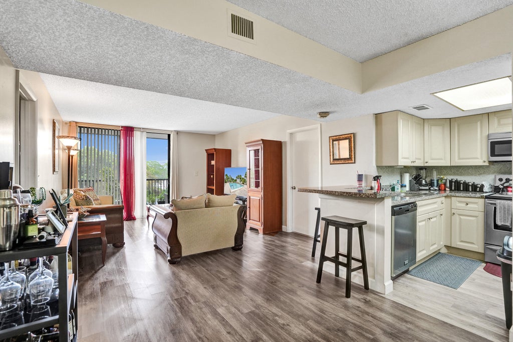 Photo of 5570 NW 44th Street #305a, Lauderhill, FL 33319 (MLS # B26045400)