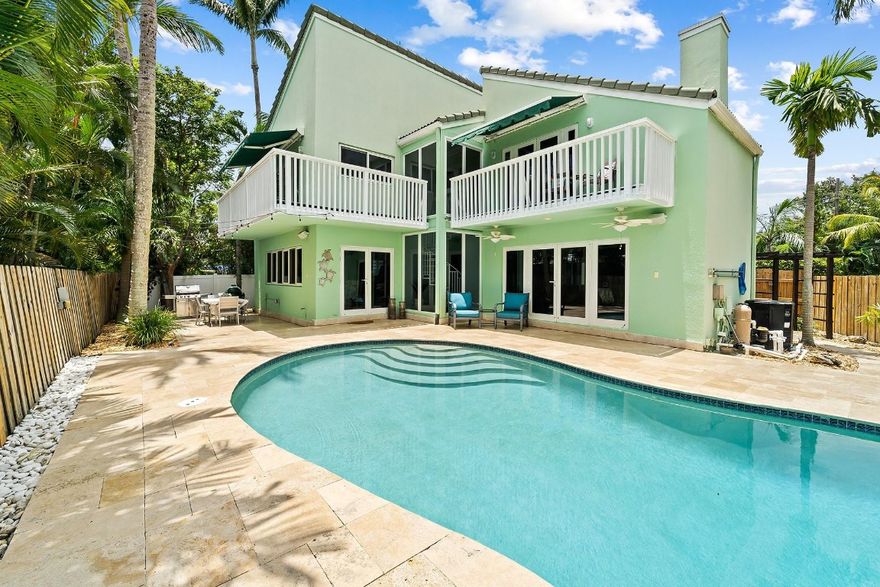 PURCHASE WITH AN ASSUMABLE LOAN FROM THE CURRENT OWNERS VA LOAN AT 2.125%...CONTEMPORARY CALIFORNIA STYLE 2 STORY IN EAST WILTON MANORS...IMPECCABLY MAINTAINED, THE HOME BOASTS 2 ALL GLASS STAIRCASE ATRIUMS. THE GREAT ROOM OFFERS SPACE TO ENTERTAIN, B/I SURROUND SOUND & DECORATIVE BRICK FIREPLACE...KITCHEN WITH ALL SS BUILT-IN APPLIANCES, QUARTZ COUNTERTOPS, & ISLAND, SUBWAY TILE & POT FILLER. PRIMARY BEDROOM WITH SITTING AREA, 2 WALK-IN CLOSETS, ENSUITE WITH STORAGE AND HUGE STEAM SHOWER...ALL BEDROOMS W/ PRIVATE BALCONIES & VIEWS OF THE RIVER. HURRICANE WINDOWS AND DOORS, ZONED A/C 3 SYSTEMS. RECESSED LIGHTING, CLIMATE CONTROLLED WINE CELLAR FOR 788 BOTTLES OF WINE AND YOUR FAVORITE CIGARS. TROPICAL BACKYARD WITH HEATED & CHILLED POOL, TRAVERTINE DECK, WALKWAYS, & LANDSCAPE LIGHTING.