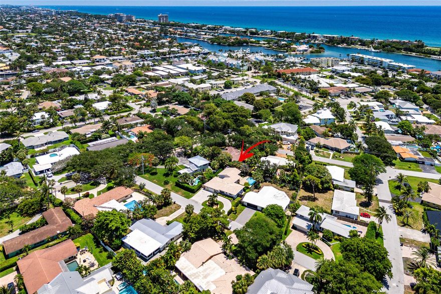 Welcome to your haven in the marina area of Lighthouse Pt. This home offers 4 beds/2 baths which includes a converted garage that is the 4th bed/bonus room. Can be easily converted back & seller will offer a credit to do so. The private primary retreat is thoughtfully situated away from the other bedrooms, 2 living spaces plus a dining room allow versatility. Natural light floods through the impact windows/doors & the updated kitchen is both stylish and functional.  Outside the tropical oasis features a covered patio that overlooks a lush backyard, complete with a sparkling pool. This outdoor paradise offers ample space for play, gardening, or simply lounging in the Florida sunshine. Lighthouse Point is a vibrant neighborhood with restaurants, shopping & parks just a stone's throw away!
