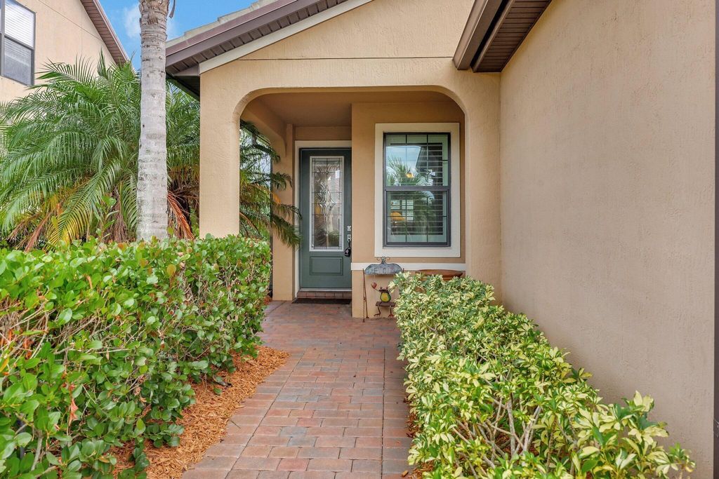 Photo of 213 SE Longview Drive, Port Saint Lucie, FL 34984 (MLS # R11069050)