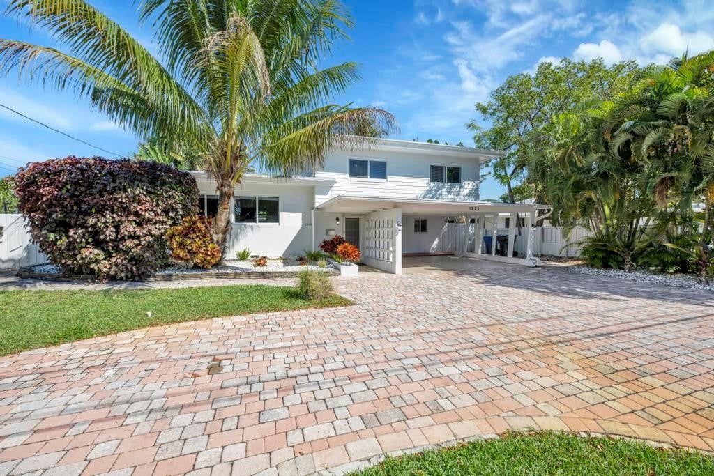 Photo of 1771 NE 35th Street, Oakland Park, FL 33334 (MLS # B26074210)