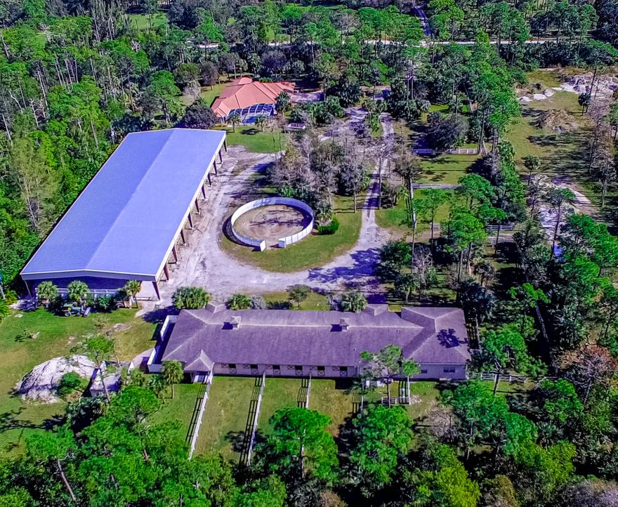 TURNKEY TRAINING FACILITY w/ COVERED ARENA!!! Stunning newer 2012 upgraded POOL home 4/3.5 ON 10 ACRES. (2 parcels), 12 STALL center aisle barn (BUILT 2012) There is plenty of room to place additional portable stalls, if so desired. ARENA DIMENSIONS - 220' x 80', COMPLETE WITH DRESSAGE MIRRORS! Easily accommodates a regulation dressage arena/hunter jumper arena. Eight PADDOCKS. 2 BR GROOM'S APARTMENT. Barn is upgraded with state-of-the-art fire sprinklers 12' X 14' stalls, indoor & outdoor wash racks, FLY control system, FOUR INDIVIDUAL TACK ROOMS, and ONE LARGE TACK ROOM. Plenty of room for addtl stalls. Six stalls have run in paddocks. Concrete and gated manure bin. GGT Arena is LIGHTED and IRRIGATED with covered spectator viewing area. COVERED MIRRORED ARENA dimensions are 220' x 80'