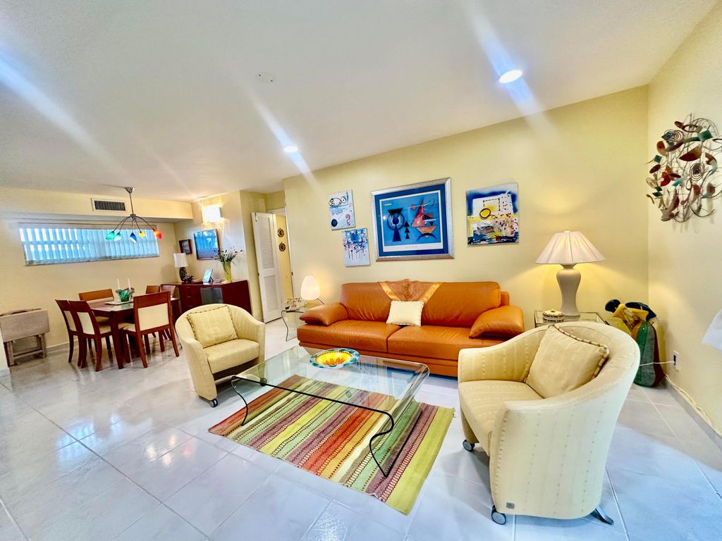 Photo of 19 Colonial Club Drive #105, Boynton Beach, FL 33435 (MLS # B26018692)