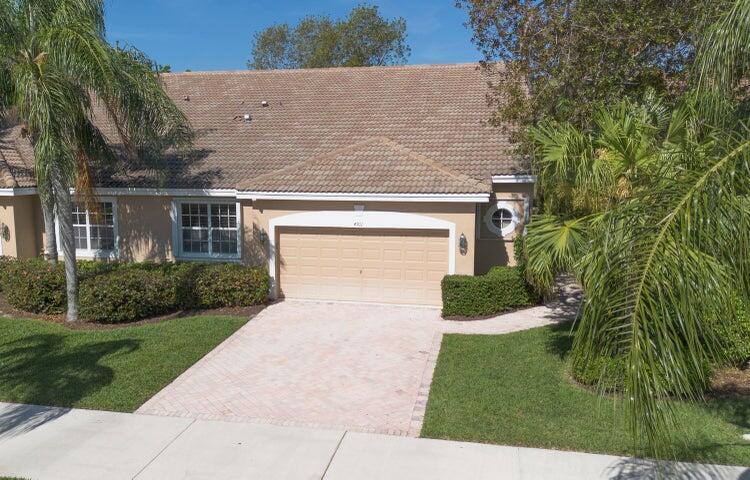 Located in the Cambridge neighborhood, this 2-bedroom + den home offers over 2,000 sq ft of living space and flexible design. The den can easily be converted into a third bedroom or home office. Features include an oversized garage with space for a golf cart, a large screened patio, and a bright great room layout with a separate dining area. The spacious kitchen includes a breakfast nook and updated appliances. The primary suite boasts two walk-in closets, dual sinks, and a separate tub and shower. Additional highlights include an interior laundry room with sink, accordion shutters, and energy-efficient southern exposure.