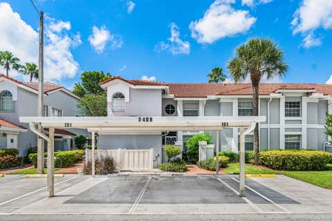 Photo of 7408 LAKE MEADOW Way #101, Boynton Beach, FL 33437 (MLS # B26060533)