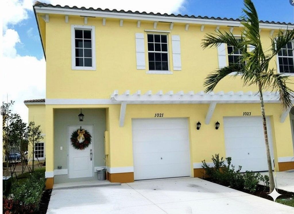 Photo of 1021 NW 40th Terrace, Lauderhill, FL 33313 (MLS # B26008974)