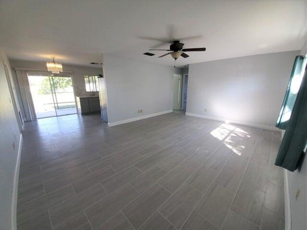 Photo of 1830 SE Balleto Street, Port Saint Lucie, FL 34952 (MLS # R10974676)