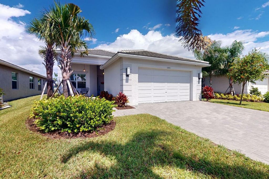 Photo of 13221 SW Blue River Road, Port Saint Lucie, FL 34987 (MLS # R11019401)