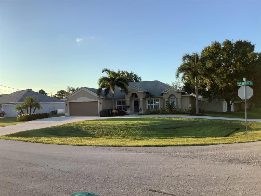 Photo of 5802 NW Basswood Drive, Port Saint Lucie, FL 34986 (MLS # R10749188)