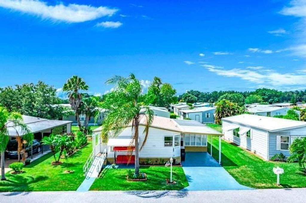 Photo of 570 Barb Ann Lane, Port Saint Lucie, FL 34952 (MLS # R10995015)