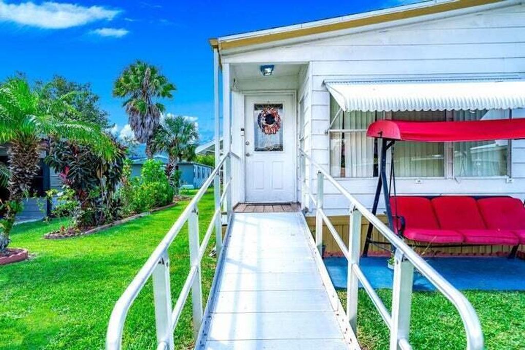 Photo of 570 Barb Ann Lane, Port Saint Lucie, FL 34952 (MLS # R10995015)